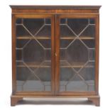 Mahogany glazed bookcase with two adjustable shelves, 110cm H x 98cm W x 28cm D