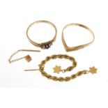 Two 9ct gold rings and two gold coloured metal earrings, the rings 2.6g