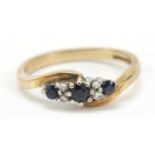 9ct gold diamond and sapphire crossover ring, size L, 2.2g
