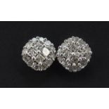 Pair of 9ct white gold diamond cluster stud earrings, 6.6mm in diameter, 1.6g