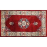 Rectangular Chinese red ground rug, 160cm x 93 cm
