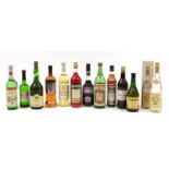 Twelve bottles of alcohol including Southern Comfort and Cinzano