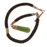 Victorian plaited hair mourning watch chain with gold coloured metal mounts and a spinach jade