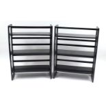 Pair of ebonised three shelf folding shelves, each 105cm H x 68cm W x 29cm D