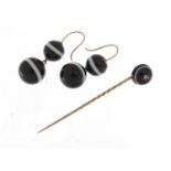 Scottish Unmarked gold agate tie pin and earrings, the tip pin set with a diamond, 6cm in length,