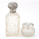 Victorian cut glass scent bottle and powder pot, both with embossed silver lids, Birmingham 1901 and