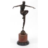 Large patinated bronze figure of an Art Deco dancer raised on a circular marble base, 57cm high