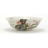 Chinese porcelain bowl hand painted in the famille rose palette with butterflies amongst cherry