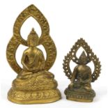 Two figures of Buddha including a bronze example, possibly Thai or from Nepal, the largest 21.5cm