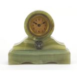 Green onyx mantle clock having Arabic numerals, the clock with applied Russian double headed