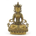Chino-Tibetan bronze figure of seated Buddha, 29cm high