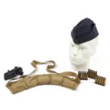 British militaria including an ammunition pouch with shell cases and side cap