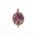 Unmarked gold mounted pink sapphire, 7.1mm x 6.4mm, 0.8g