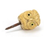 19th century carved ivory owl head walking stick pommel with beaded eyes, 6.5cm high