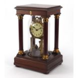 Gustav Becker, anniversary clock with glass dome housed in a mahogany four pillar case, the enamel