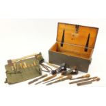 Vintage tools housed in a stained pine toolbox including Ludhra plane, chisels, some with boxwood