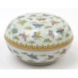 Large Chinese porcelain box and cover decorated with butterflies, 27.5cm in diameter