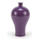 Chinese porcelain Meiping vase having a purple glaze, six figure character marks to the base, 22cm