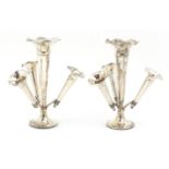 Cohen & Charles, pair of Edward VII silver four branch epergnes, Birmingham 1907, 18cm high, 430.0g