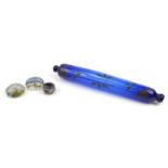 Two 19th century glass paperweights, Bristol blue rolling pin and a Chinese cloisonné salt, the
