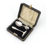 Arthur Price & Co Ltd, George VI silver christening baby's spoon and food pusher housed in a