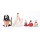 Four collectable figures and a Royal Doulton London Bobby character jug, the largest 12cm high