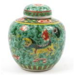 Chinese porcelain ginger jar with cover hand painted in the famille verte palette with mythical