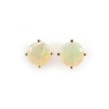 Pair of 9ct gold opal stud earrings, 5.8mm in diameter, 1.0g