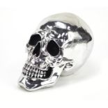 Silvered model of a human skull, 20cm high