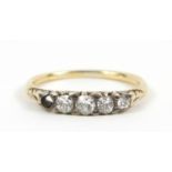 Unmarked gold graduated diamond ring, size N, 2.0g