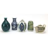 Iznik pottery including three vases hand painted with stylised animals and flowers, the largest 17.
