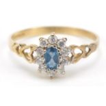 9ct gold blue topaz and cubic zirconia cluster ring, size O, 1.3g