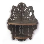 Colebrookdale style cast iron hanging corner shelf cast with flowers, 40cm high