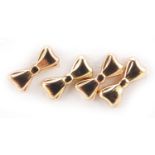 Two pairs of 9ct gold bow design stud earrings, 9mm in length, 0.6g
