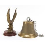 Brass ship's bell and brass eagle, the largest 25cm high