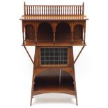 Liberty & Co, Arts & Crafts walnut display cabinet with leaded glazed door, part Liberty & Co Regent