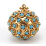 Continental gold turquoise globular pendant, impressed marks to the suspension loop, 2.2cm in