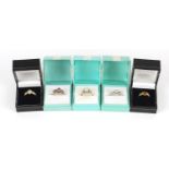 Five silver rings set with semi precious stones housed in gift boxes, various sizes, 21.5g