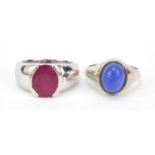 Two silver rings including one set with a ruby, sizes N and P, 11.8g