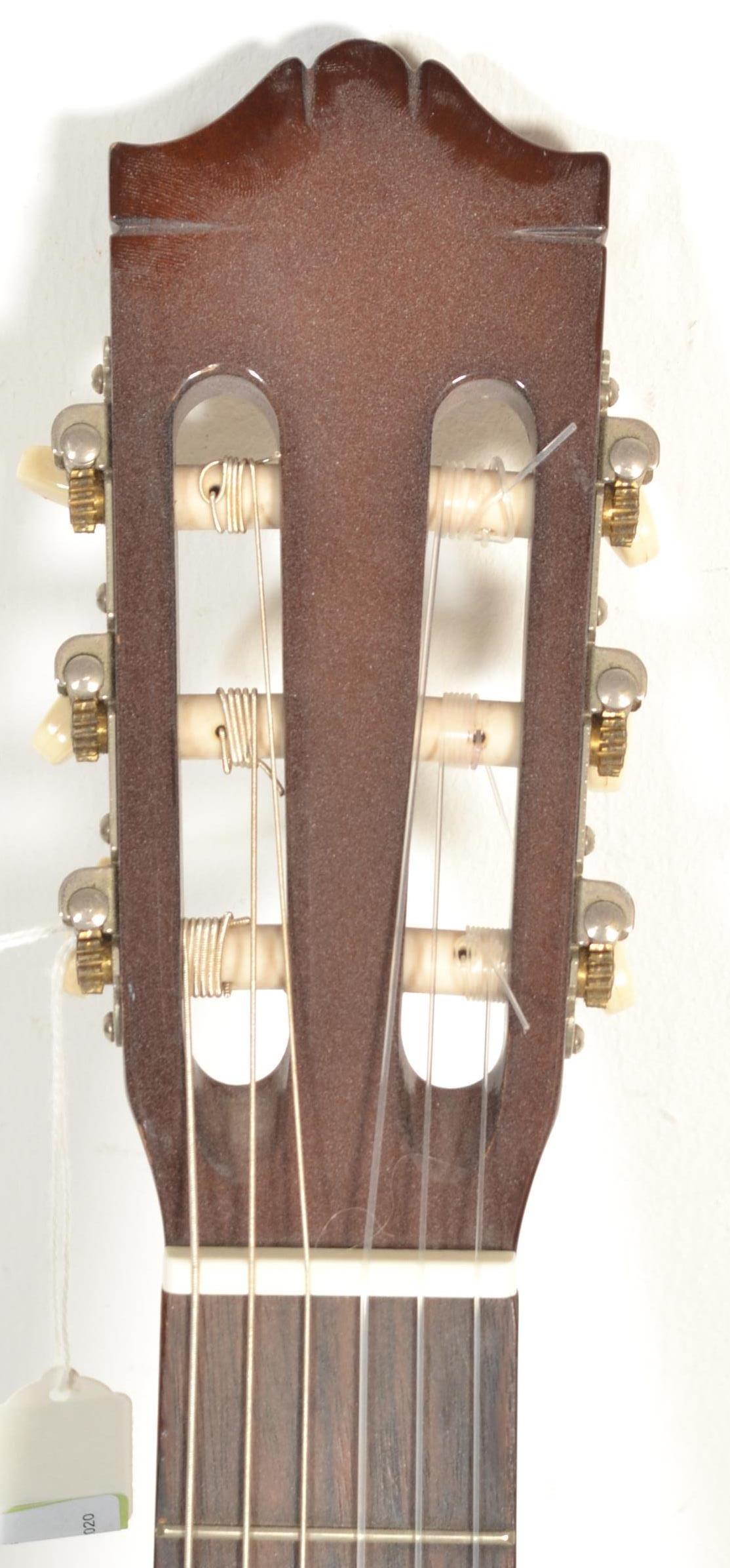 A 20th Century six string acoustic Yamaha C-40 Spanish style guitar, applied paper label to inside. - Image 2 of 6