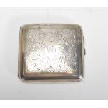 An early 20th Century Henry Williamson silver hallmarked cigarette case having an engraved