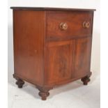 A 19th Century mahogany commode chest formed as a bow front chest, turned handles to the false