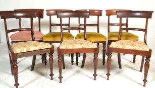 A set of 6 Regency 19th century mahogany bar back dining chairs. Raised on turned legs with