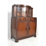 A 1930’s Art Deco dark oak  bow fronted sideboard display cabinet with half moon display cabinet