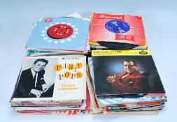 A good collection of 45rpm vinyl 7" singles dating from the 1960's to include many artists and