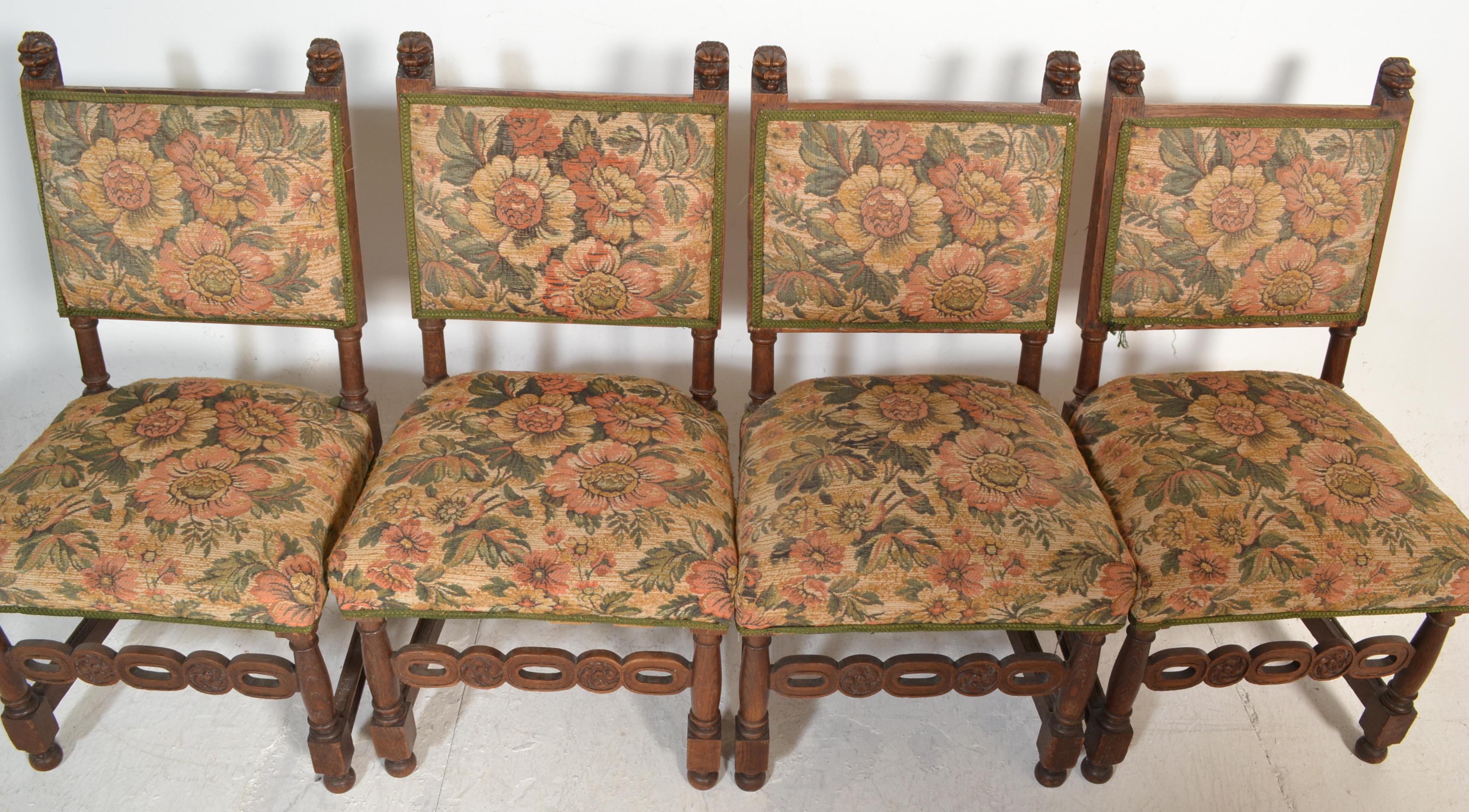 A set of 4 Victorian 19th century carved oak and tapestry upholstered dining chairs. Raised on - Image 2 of 4