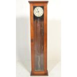 A vintage 20th Century Gents Pul-Syn-Etic Impulse clock, within an oak case having a single glazed