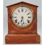 A Victorian 19th century 8 day mantel / bracket clock set within  oak case with brass embellishments