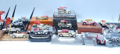 A large collection of Matchbox Vintage toy car topped ashtrays, trinket boxes, pen holders, pipe