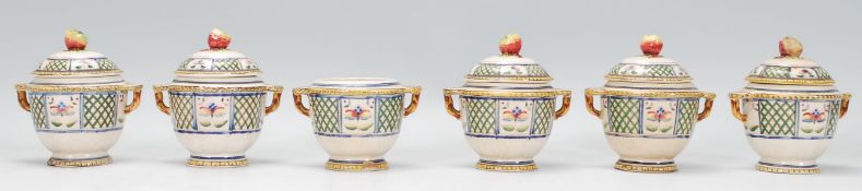 A collection of six early 20th Century French ceramic lidded pot / apple sauce / preserve jars